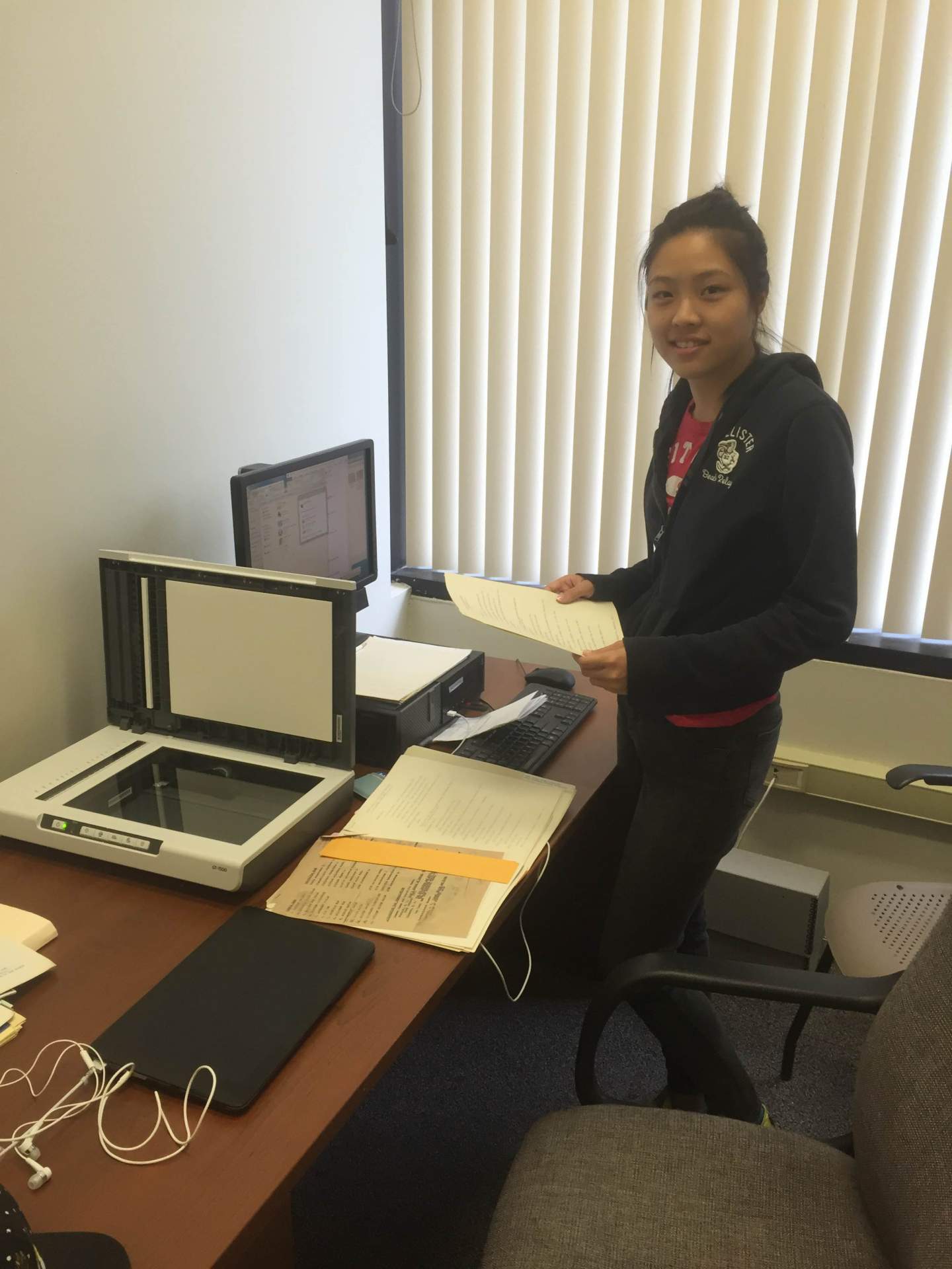 Intern Cindy Huang at the Buffalo State Archives researching Edna Lindemann