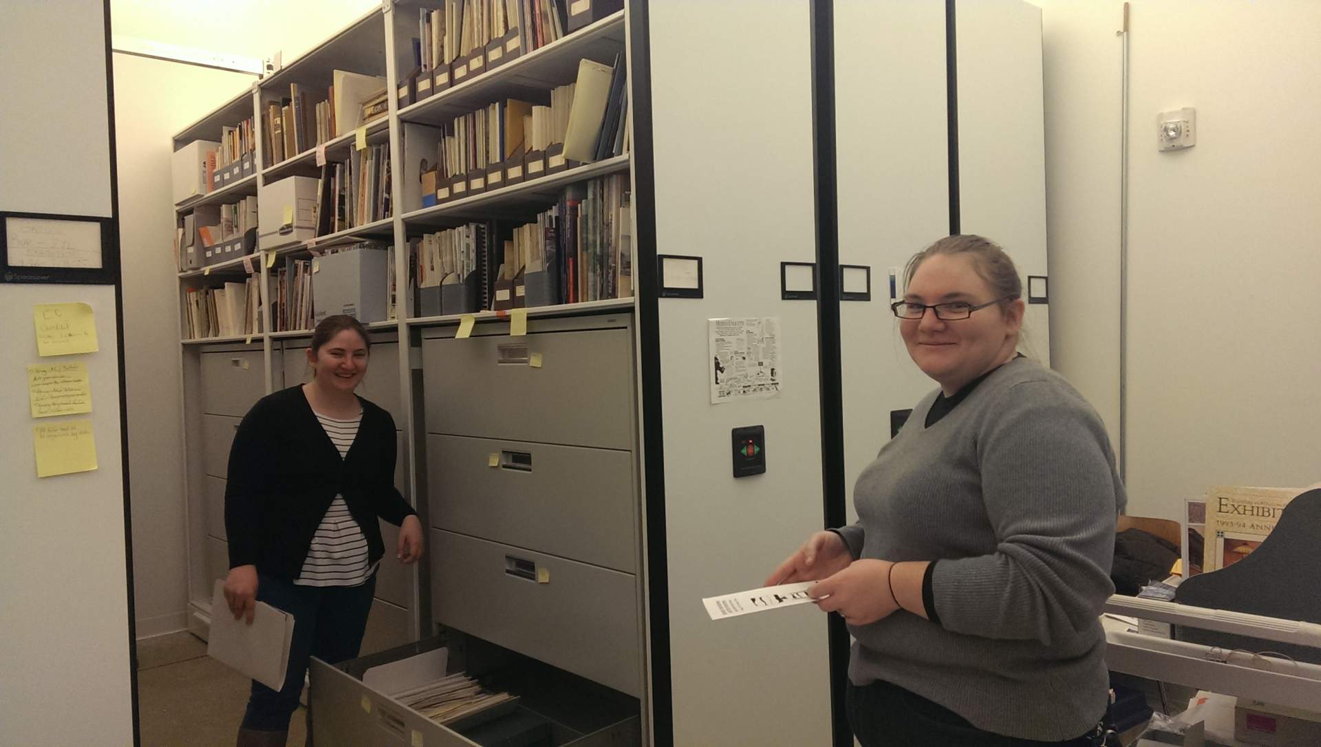 Work Study employees Emily Simms and Michelle Meyers in the Burchfield Penney Art Center Archives
