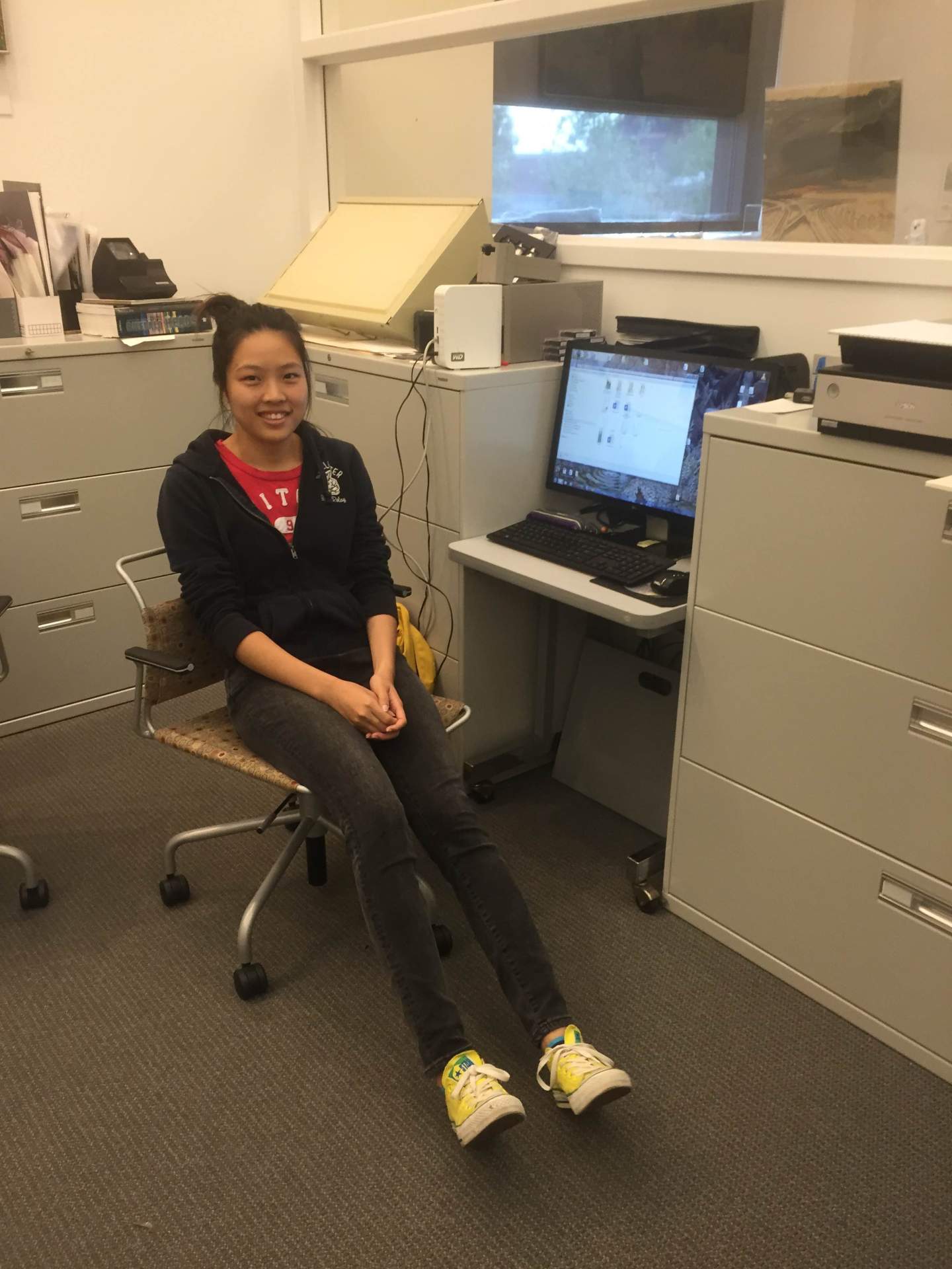 Intern Cindy Huang at the Burchfield Penney Art Center Archives