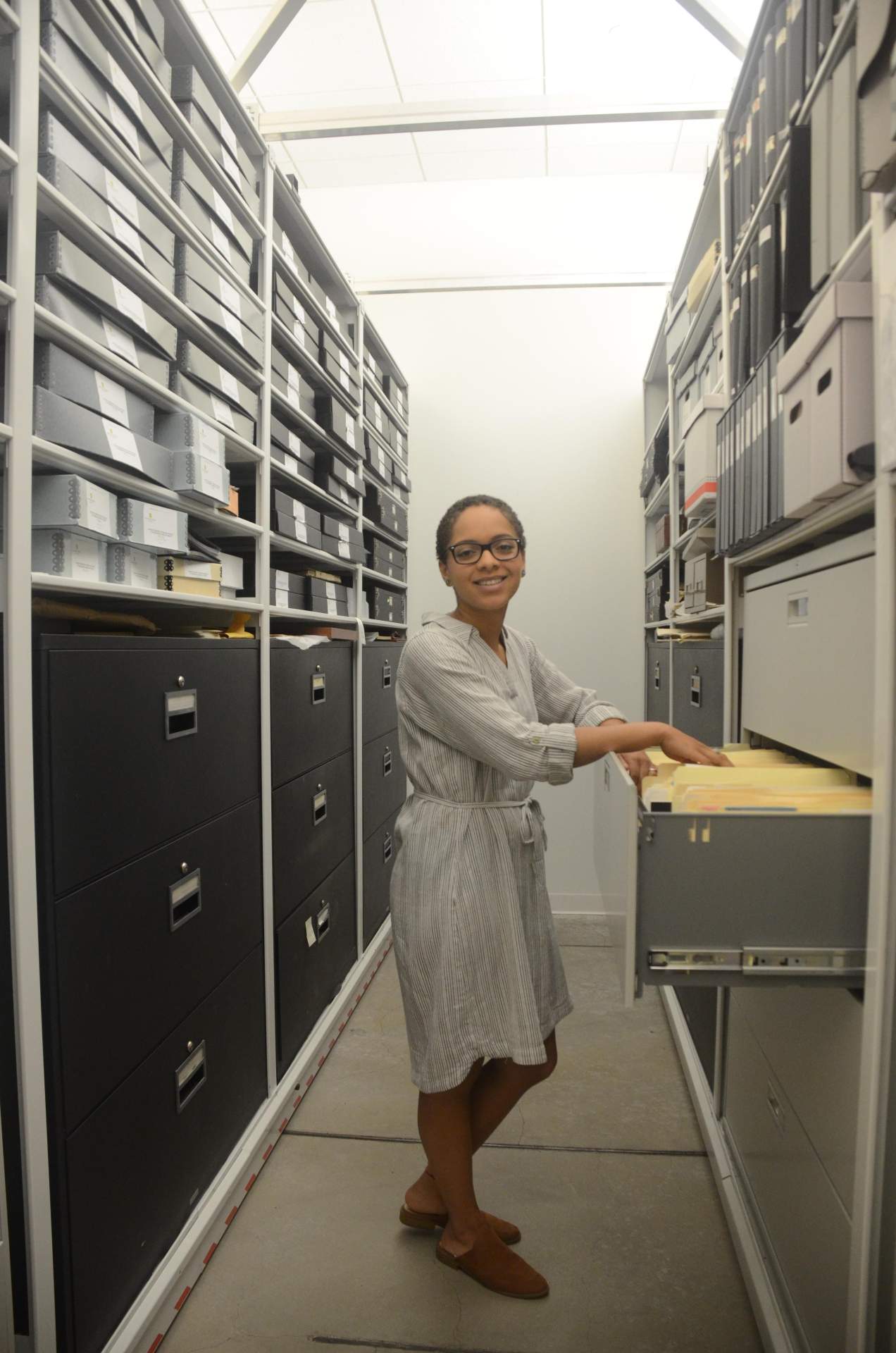Shanel Kerkes working with the Burchfield archives