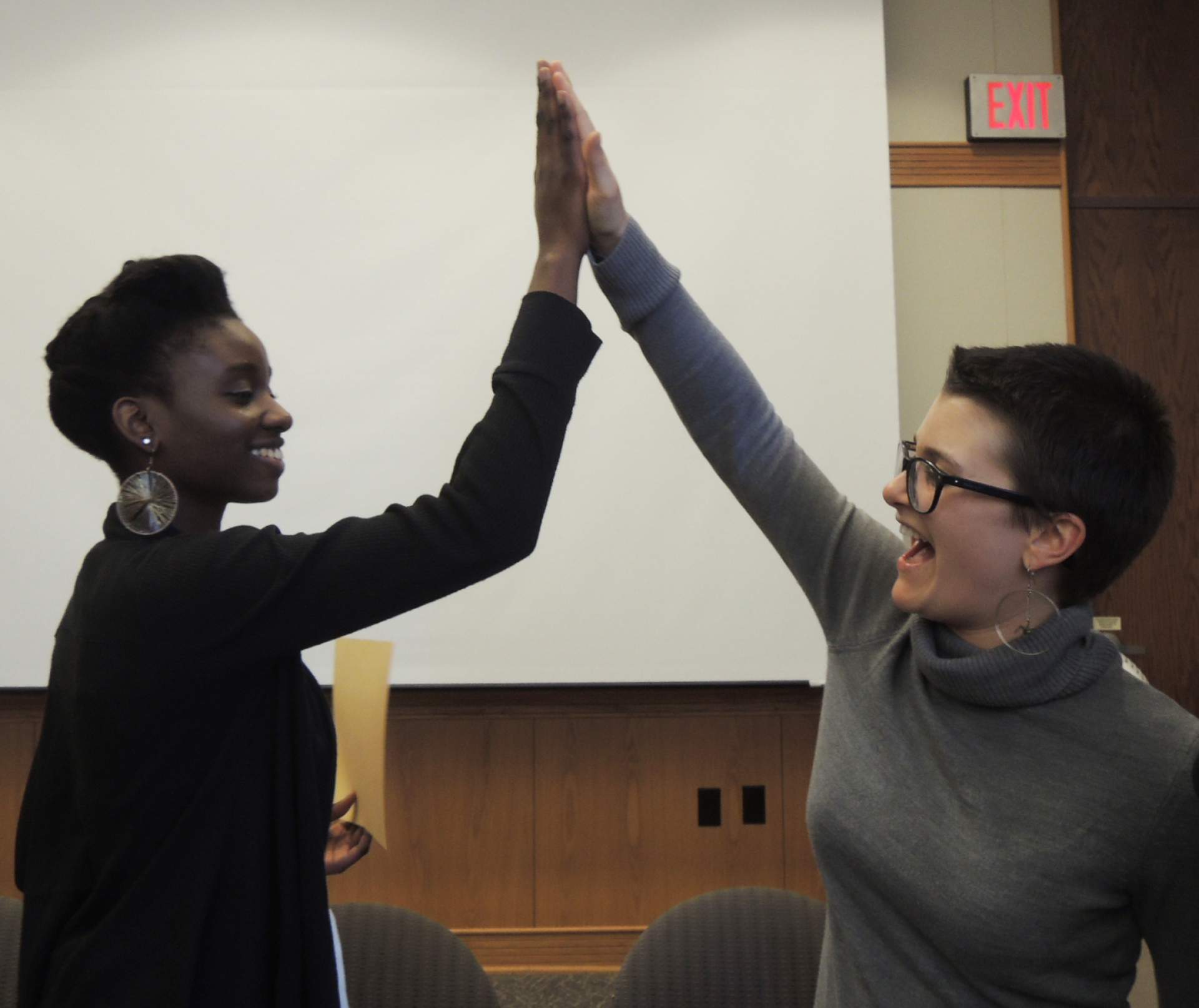 Esther Ekong and Heather Gring Sharing a Celebratory High-five