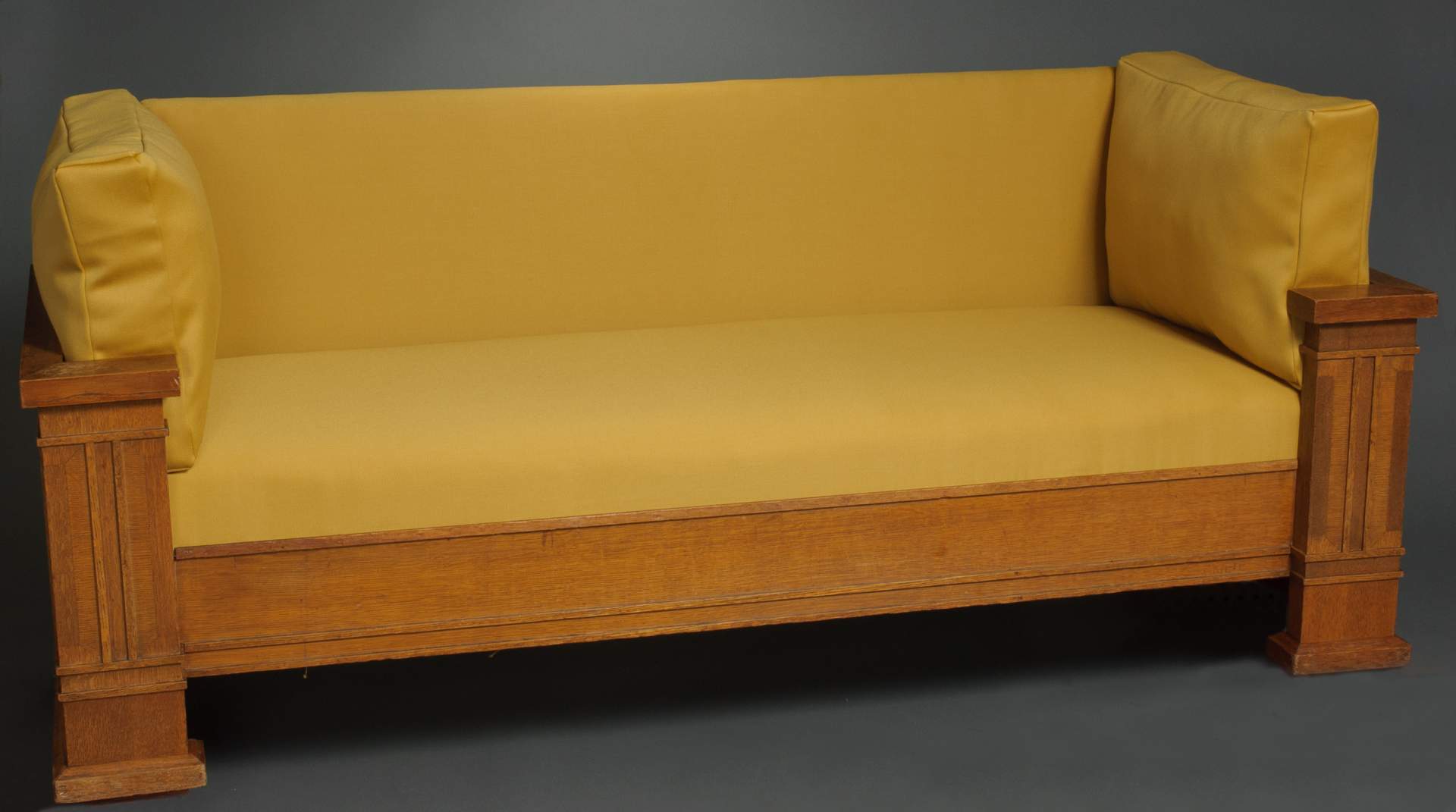 Sofa w/two reproduction pillows