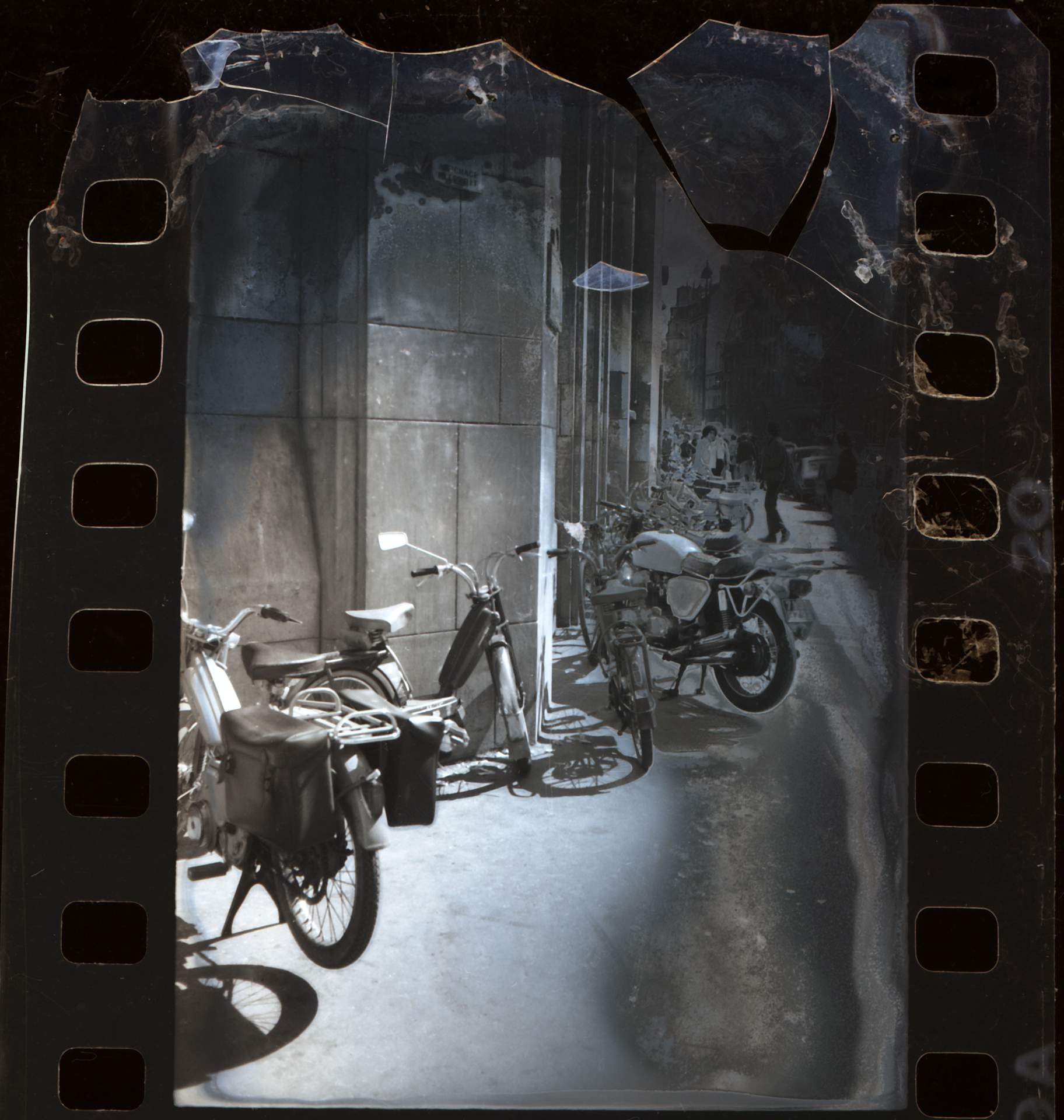 Untitled photographic negative (Street in Paris with motorbikes)