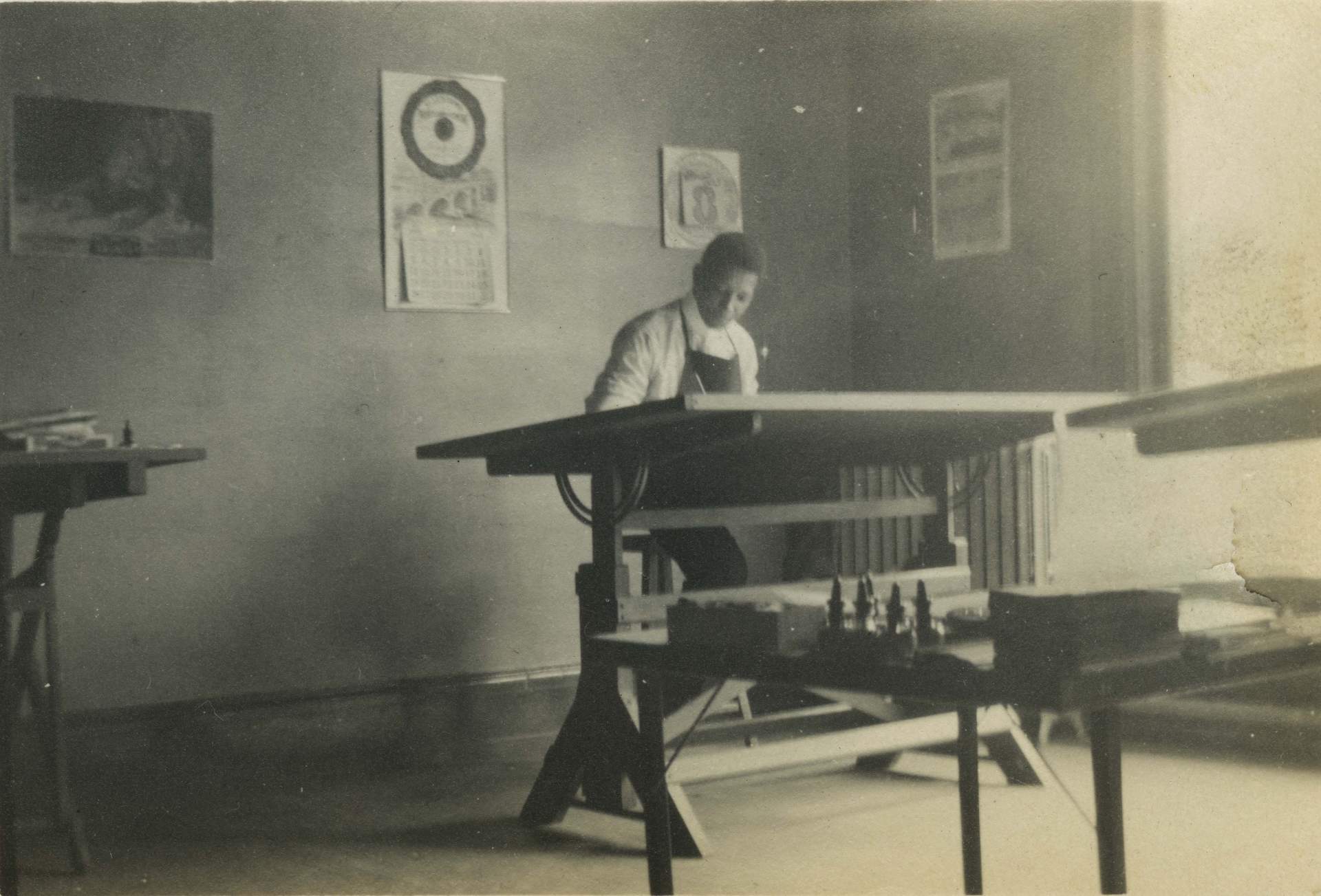 John E. Brent at drafting table