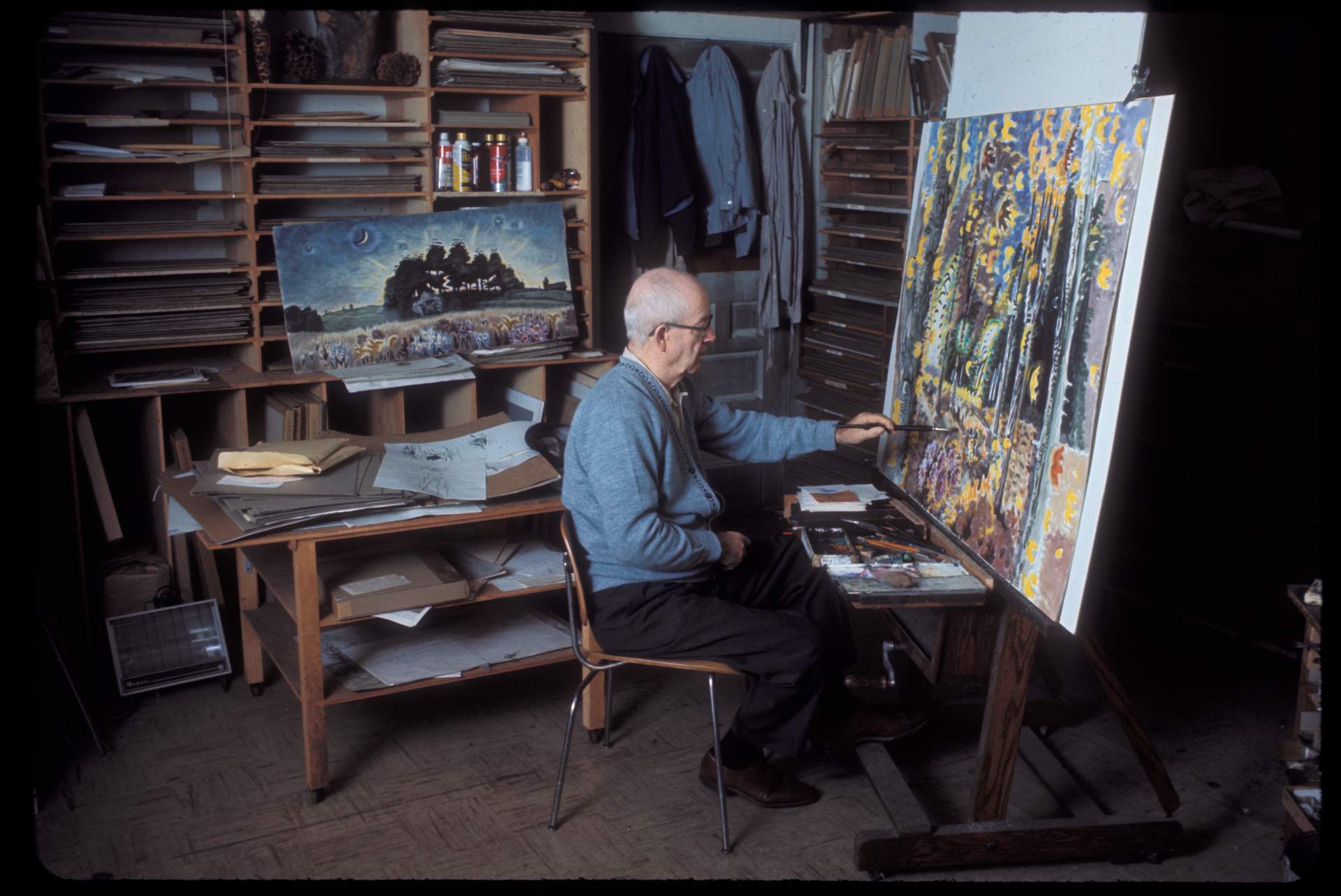 Charles E. Burchfield Seated at His Easel